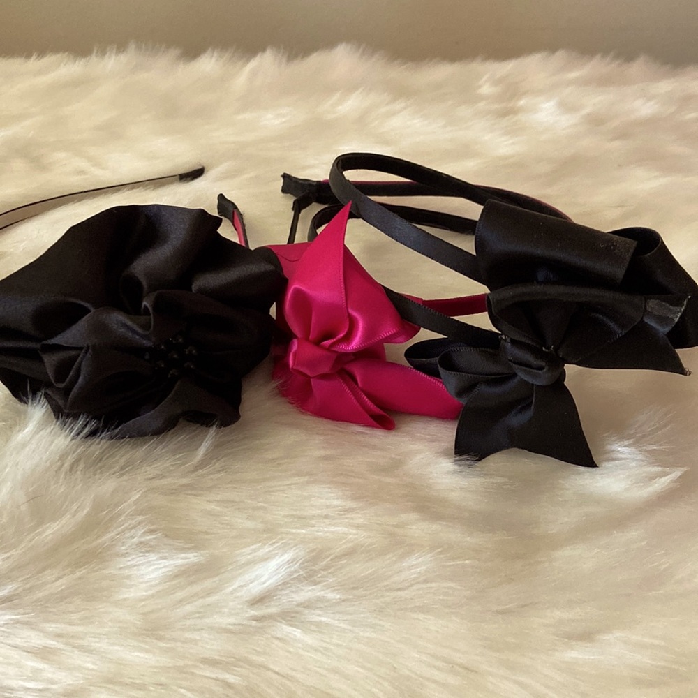 Bundle of three head bands- two black, one fuchsia coloured.